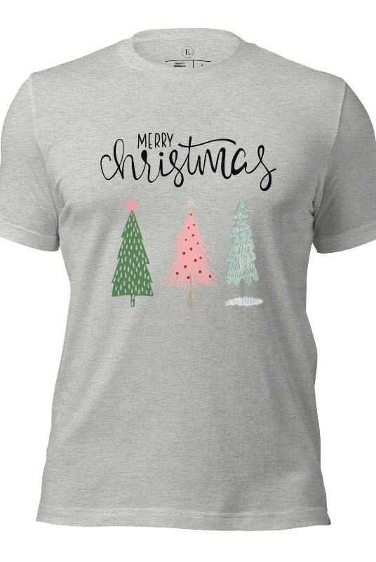 Elevate your festive wardrobe with our trendy shirt and make a chic statement this Christmas. The design features a stylish "Merry Christmas" message along with modern pink and teal Christmas trees on an athletic heater grey shirt. 