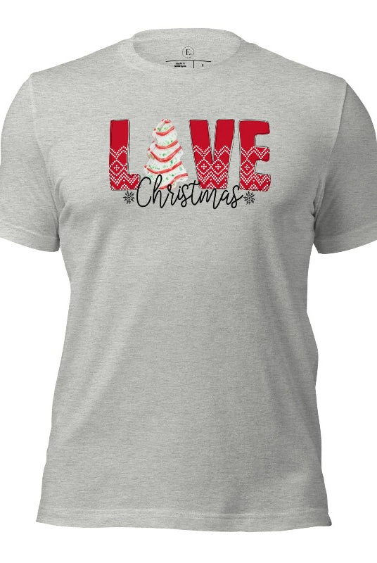 Spread love and joy this holiday season with our Christmas shirt featuring the classic Christmas tree cake, which is incorporated into the word "Love" on a athletic heather grey colored shirt.
