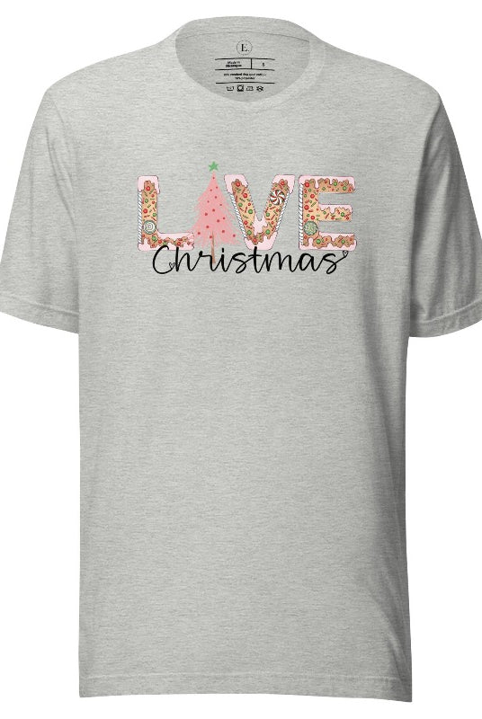 Get ready to celebrate the holiday season in style with our Christmas shirt featuring cute gingerbread cookies arranged to spell out the word "Love" on a athletic heather grey colored shirt.