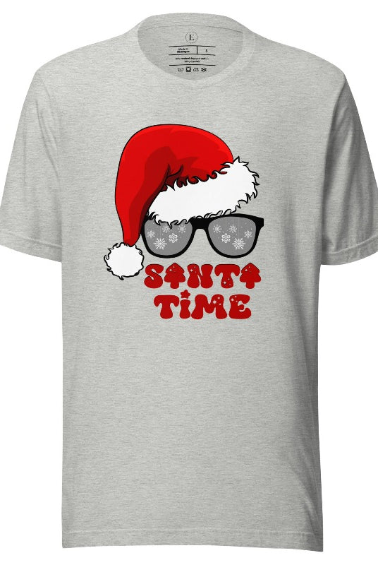 Gear up for the holiday season with our men's Christmas Shirt featuring a Santa hat, Christmas sunglasses on an athletic heather grey colored shirt. 