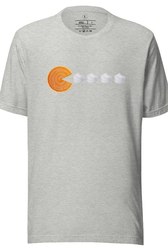 Level up your style with our playful t-shirt featuring a pumpkin pie shaped like Pac-Man devouring whipped cream swirls on an athletic heather grey shirt. 
