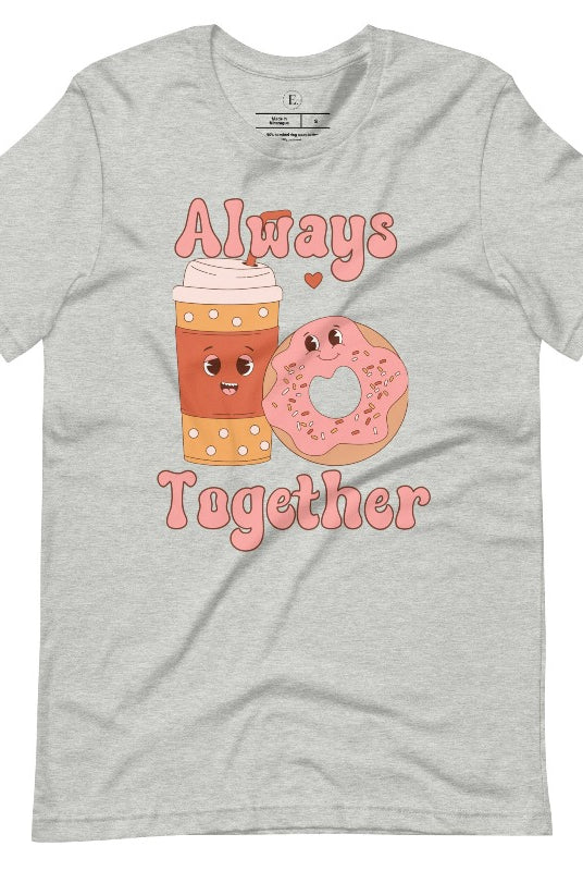 Celebrate love with our adorable Valentine's Day graphic tee! Featuring a smiling coffee cup and a cheerful donut holding hands, on an athletic heather grey shirt. 