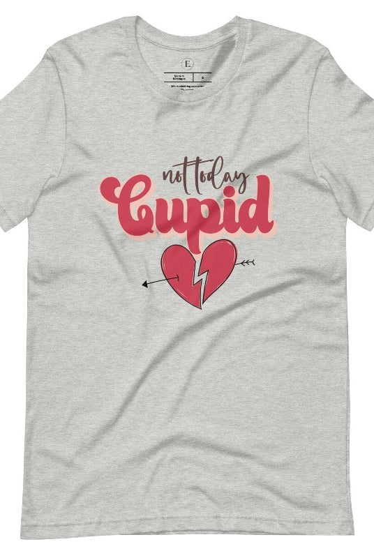 Spice up your Valentine's Day with our edgy shirt featuring a broken heart pierced by an arrow, and the defiant phrase "Not Today Cupid" on an athletic heather grey shirt. 