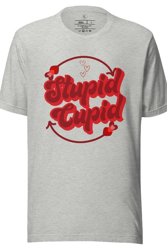 Express your Valentine's Day attitude with our bold and cheeky shirt proclaiming "Stupid Cupid" on an athletic heather grey shirt. 