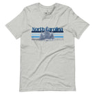 Show your school pride with this iconic North Carolina wordmark t-shirt. Made from premium materials, it features a North Carolina tree line in a the cool Carolina blue colors, representing a tradition of excellence for the nature that North Carolina offers on an athletic heather grey shirt. 