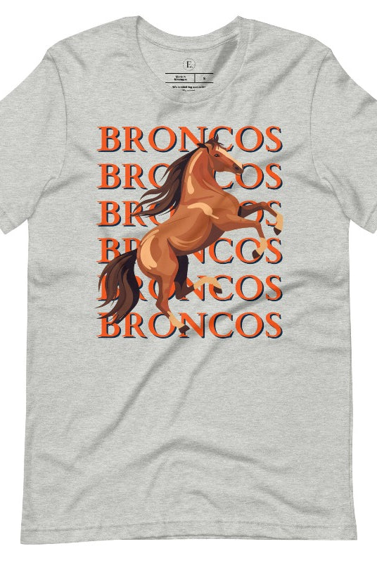 Saddle up for game day fun with our Bella Canvas 3001 unisex graphic tee! Gallop into Broncos spirit with our exclusive design featuring a lively Bronco horse and the spirited mantra "Broncos Broncos Broncos Broncos" on an athletic heather grey shirt. 