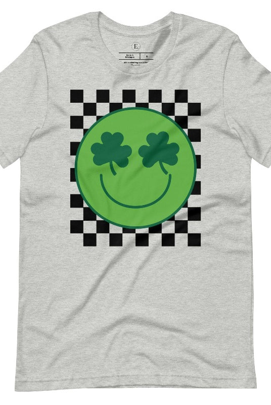 Get in the Saint Patrick's Day spirit with our Bella Canvas 3001 unisex graphic t-shirt! This unique design features a retro green smiley face with shamrock eyes, perfect for those seeking a festive and nostalgic look on an athletic heather grey shirt. 
