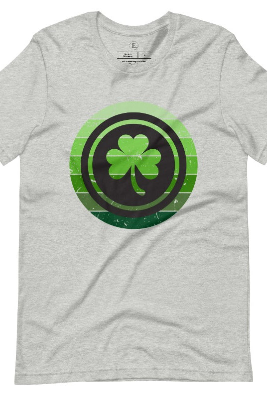 Get your ultimate Saint Patrick's Day attire with our Bella Canvas 3001 unisex graphic t-shirt! Featuring a captivating circle design in various shades of green, topped with a prominent shamrock, on an athletic heather grey shirt. 