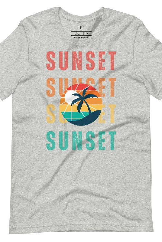 Capture the essence of tropical paradise with our Sunset t-shirt. This shirt features four rows of the word 'sunset' surrounding a stunning palm tree, bringing a laid-back, beachy vibe to your wardrobe with this heather athletic grey shirt. 