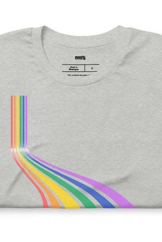 Colorful rainbow design with the word 'teacher' at the bottom, showcased on a teacher graphic tee. The perfect choice for teacher shirts and teacher gifts. Grey graphic tees.