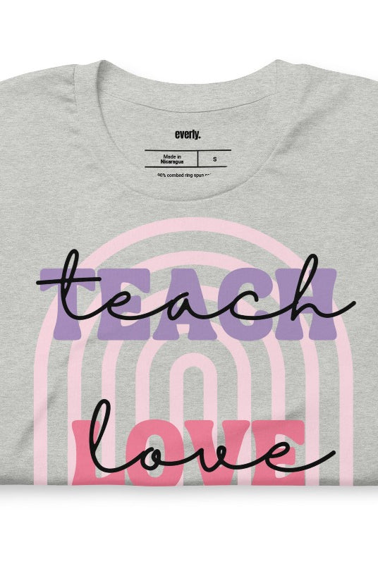 Boho rainbow design featuring the words 'teach love inspire' on a teacher graphic tee, ideal for teacher shirts and teacher gifts. Grey graphic tees. 
