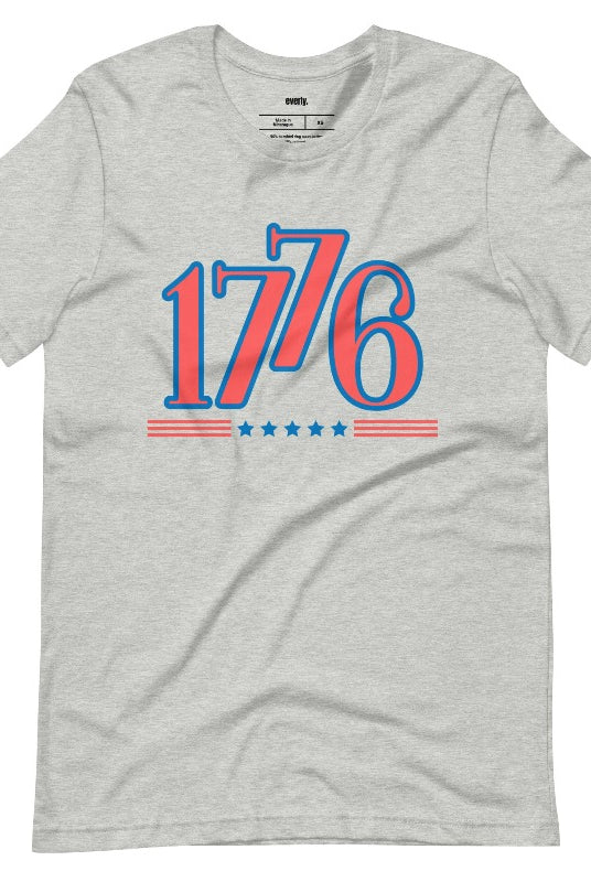Close-up of a USA July 4th graphic t-shirt with the number '1776' prominently displayed on the front. The shirt features a patriotic design and is perfect for celebrating Independence Day in style on a athletic grey graphic t-shirt.