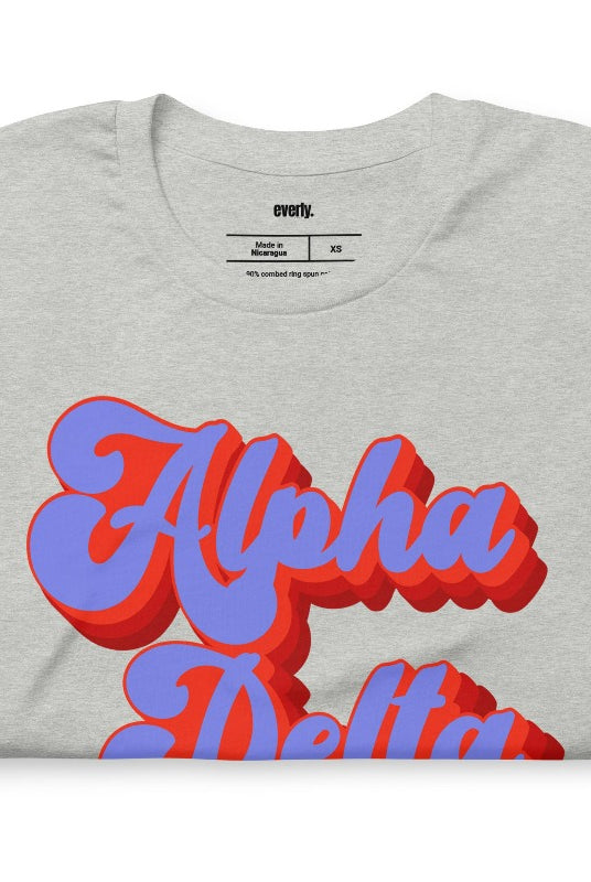 Grey graphic tee featuring 'Alpha Delta Chi' in retro lettering