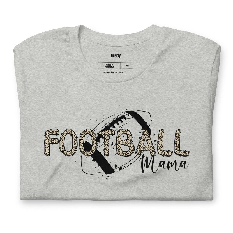 a playful design with a football graphic and the words "Football Mama" in leopard print on a grey shirt.