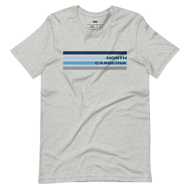 a design featuring blue stripes and "North Carolina" text  on a grey shirt.