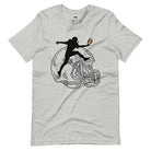 a black silhouette of a football player leaping to catch a football, superimposed on a large, sketched football helmet on a grey shirt. 