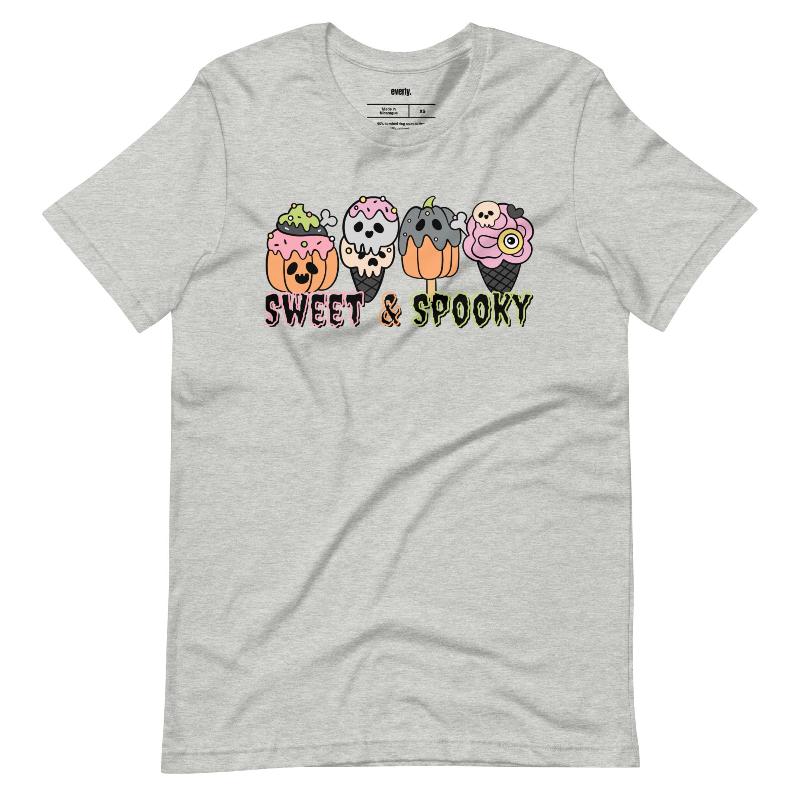 Grey t-shirt featuring a fun 'Sweet & Spooky' design with Halloween-themed ice cream cones, skulls, pumpkins, and spooky treats.