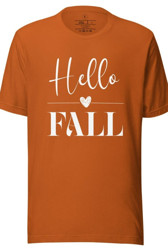 Hello Fall with heart between Hello and Fall graphic tee on a autumn colored shirt.