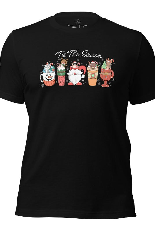 Wrap yourself in cozy holiday vibes with our Christmas coffee cup shirt. With a festive design that says "Tis The Season," this shirt captures the essence of warmth and joy on this black colored shirt. 