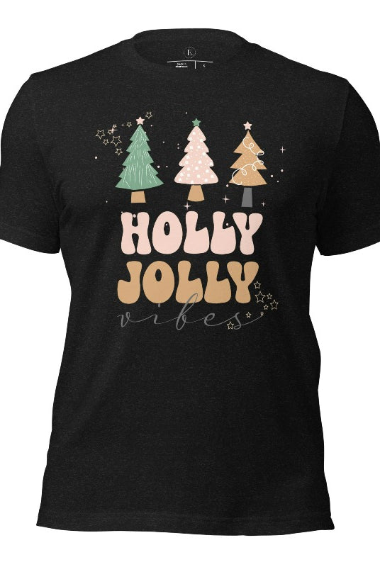 Get ready to feel the holly jolly vibes with our Christmas shirt! This festive shirt features a playful message that reads "Holly Jolly Vibes" and is adorned with cheerful Christmas trees, radiating the holiday cheer on a black heather grey shirt.