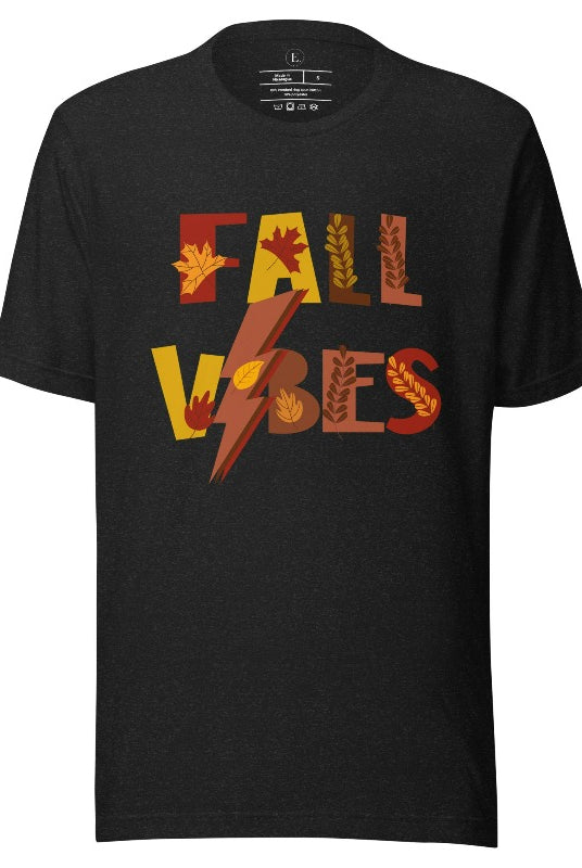 Get into the autumn spirit with our Fall Vibes shirt. Featuring the words 'Fall Vibes' with a creative twist- a lighting bolt replacing the 'I'- this shirt captures the energy of the season. Adorned with leaves, it adds a touch of nature's beauty on a black shirt. 