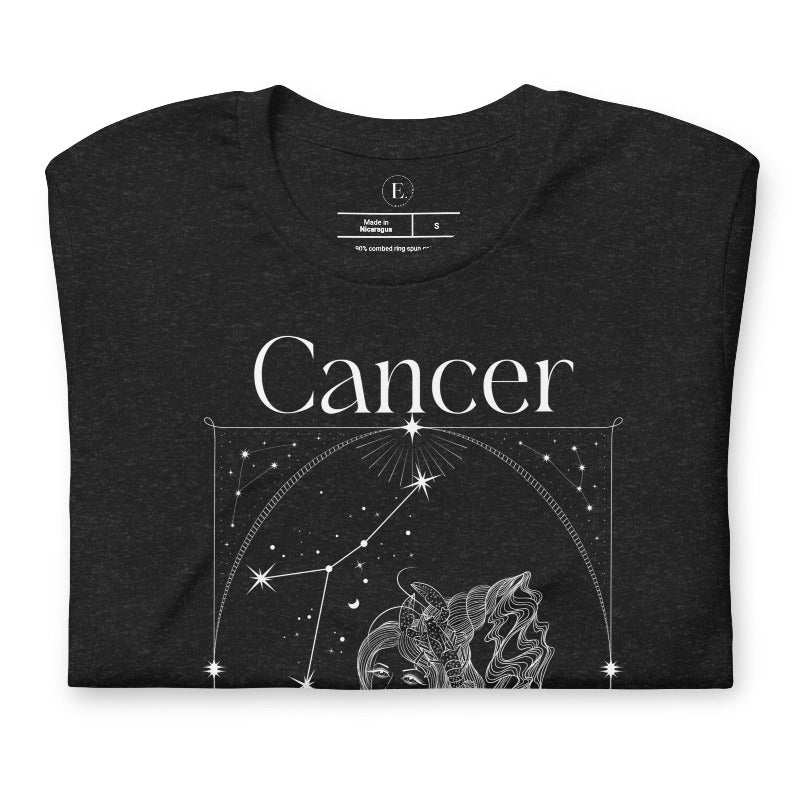 Bella + Canvas 3001 black heather Cancer Zodiac shirt featuring an intricate Cancer symbol design, constellation, and dates June 21 - July 22.