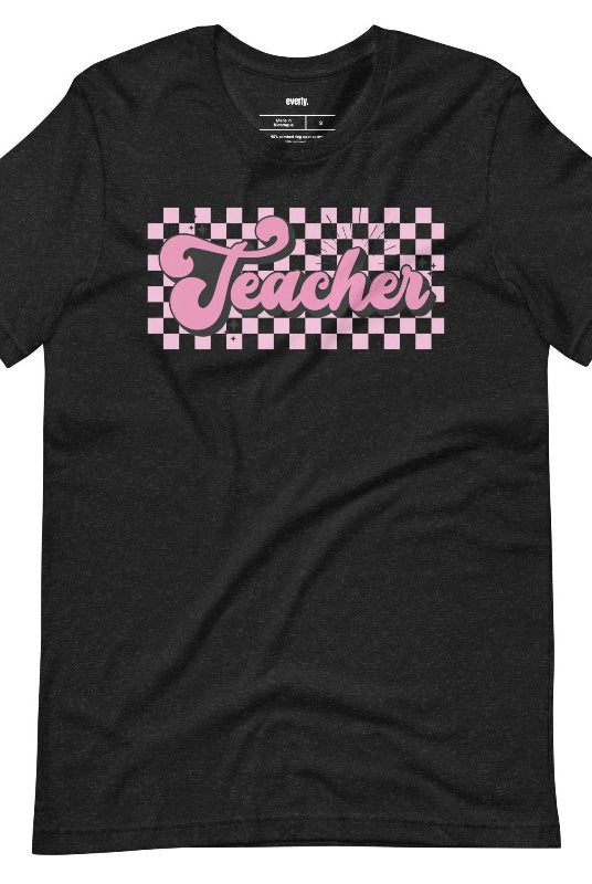 Retro lettering design with the word 'teacher' on a checkered background, featured on a teacher graphic tee. Perfect for teacher shirts and teacher gifts. Black graphic tees. 