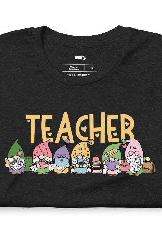 Black teacher graphic tee featuring adorable teacher gnomes and the word 'teacher' - perfect for teacher shirts and teacher gifts. Available in black and white graphic tees.