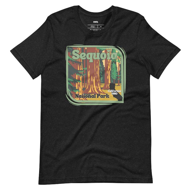 a vibrant illustration of Sequoia National Park, showcasing towering sequoia trees with a vintage-inspired design on a black shirt.