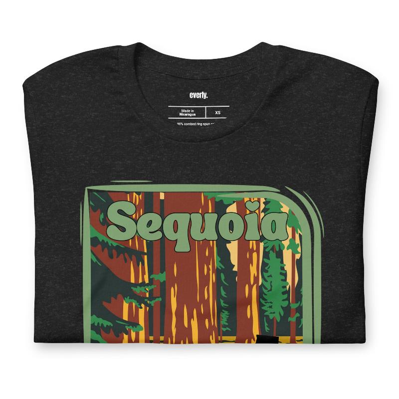 a vibrant illustration of Sequoia National Park, showcasing towering sequoia trees with a vintage-inspired design on a black shirt.