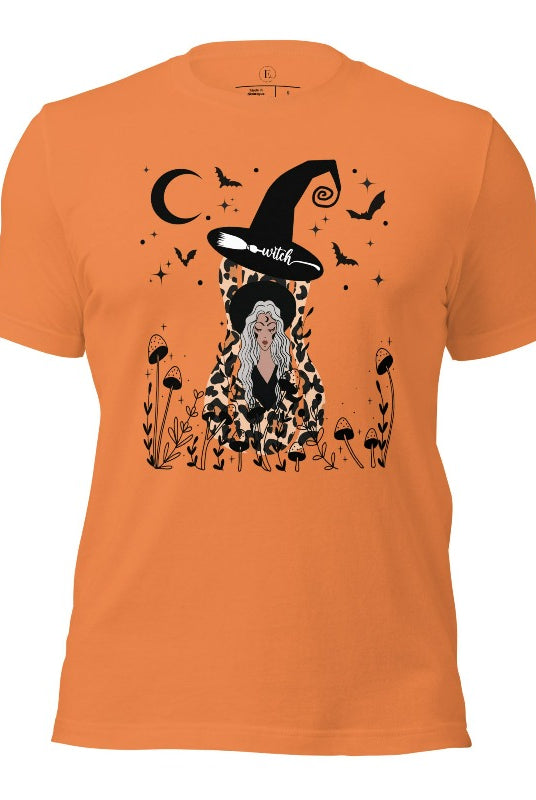 Elevate your Halloween style with our striking shirt featuring a cheetah print squash and a stylish lady donning a witch hat adorned with flowers and bats. Embrace the enchanting fusion of nature and magic on a burnt orange shirt. 