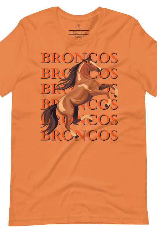 Saddle up for game day fun with our Bella Canvas 3001 unisex graphic tee! Gallop into Broncos spirit with our exclusive design featuring a lively Bronco horse and the spirited mantra "Broncos Broncos Broncos Broncos" on a burnt orange shirt. 