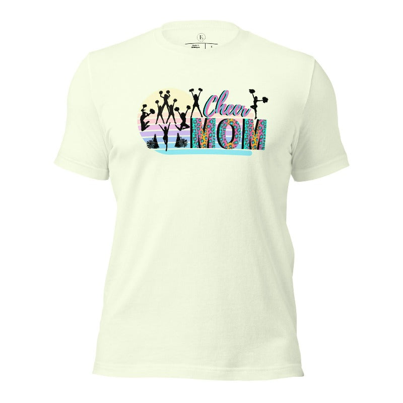 Get your cheer on with our stylish cheer mom shirt. Perfect for proud moms supporting their cheering stars. Made with love, this shirt combines comfort and fashion, letting you show off your team spirit. Join the cheer squad and cheer your heart out in style on a citron colored shirt. 