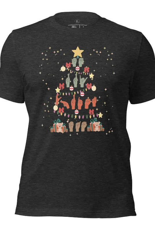 Add festive cheer with this ASL Merry Christmas t-shirt. The hands skillfully shape the words 'Merry Christmas' in American Sign Language, forming a beautiful Christmas tree design on a dark grey colored shirt.