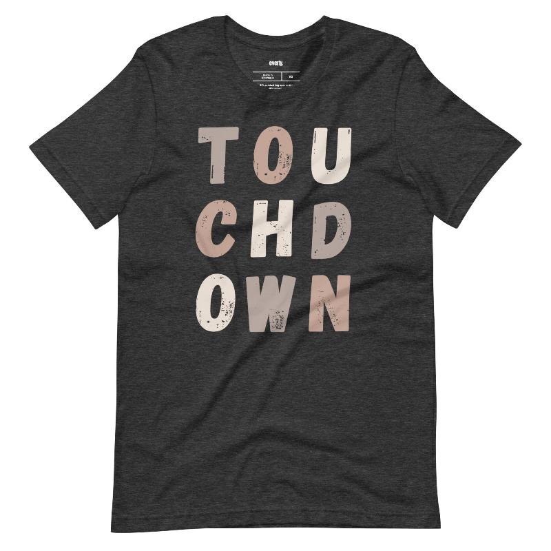 the word "TOUCHDOWN" in a stylish, distressed font with shades of brown, perfect for football fans on a dark grey shirt