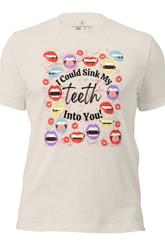 Sink your teeth into Halloween style with our vampire lips shirt. Adorned with a collection of seductive vampire lips, this shirt mesmerizes with its allure. The cheeky message, 'I could sink my teeth into you,' adds a playful twist on a heather dust colored shirt. 