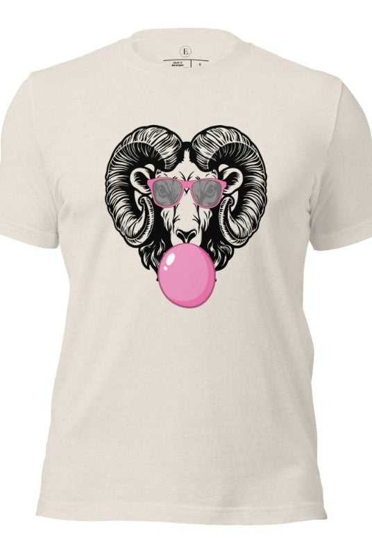A ram blowing bubble gum with sunglasses on on a heather dusty tan colored shirt.
