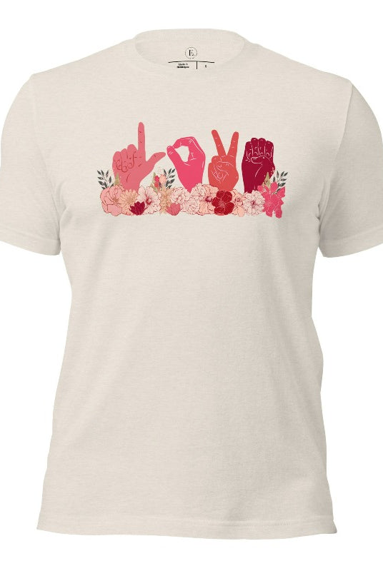 ASL hands signing love in floral flowers on a heather dust colored shirt.