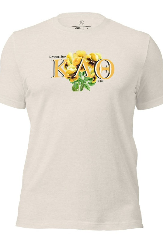 Show your Kappa Alpha Theta pride with our sorority t-shirt! Our design features the sorority letters and a striking black and gold pansy, symbolizing sisterhood and strength on a heather dust shirt. 