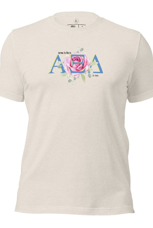 Show your Alpha Xi Delta pride with our stylish t-shirt featuring the sorority's letters and iconic pink rose on a heather dust shirt. 