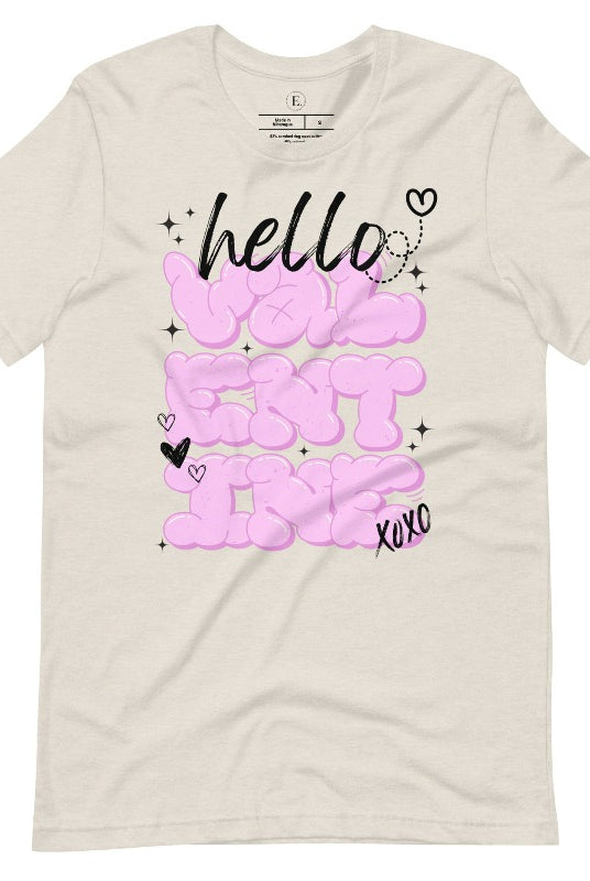 Make a bold statement this Valentine's Day with our street-style graffiti tee! Featuring "Hello Valentine" In eye-catching bubble lettering, on a heather dust colored shirt. 