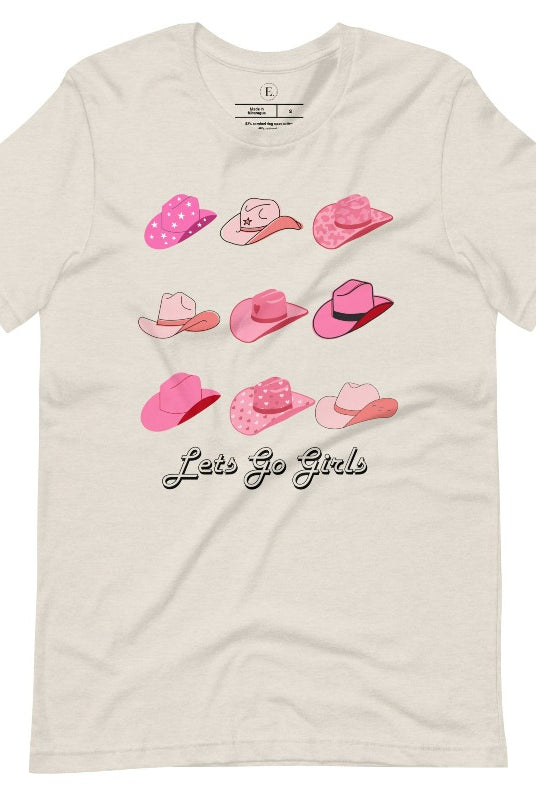 Get ready to wrangle in style with our country western shirt collection. Featuring a variety of pink cowboy hats and the classic phrase "Let's Go Girls," on a heather dust colored shirt. 