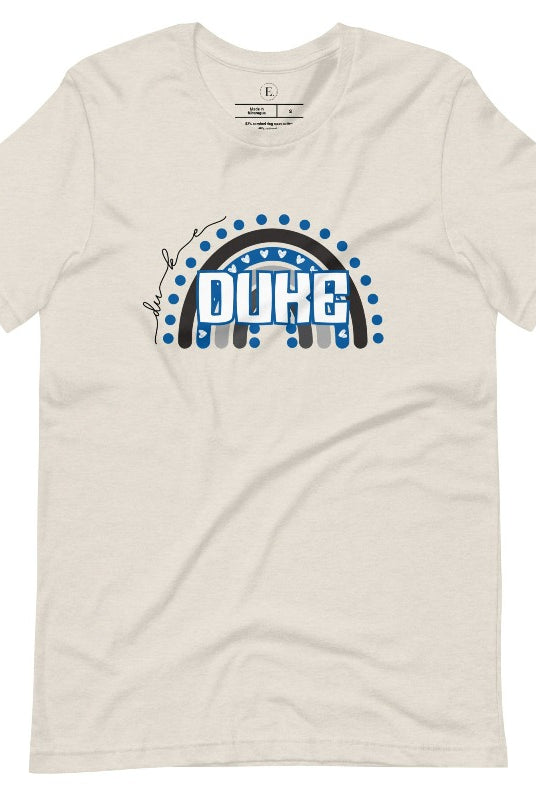 Celebrate diversity and show your support for Duke University with our eye-catching college t-shirt. Our shirt features the Duke colors on a captivating rainbow design, embodying the spirit of inclusion and unity with the iconic Duke wordmark atop the rainbow on an heather dust colored shirt. 