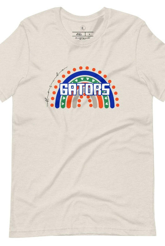 Show off your UF spirit in style with this boho-inspired t-shirt from the University of Florida. The UF colors stands out on this vibrant rainbow background, displaying the school's mascot name in a trendy and unique way on a heather dust colored shirt. 