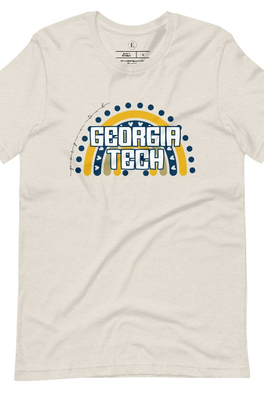 Elevate your Georgia Tech pride with this boho-inspired university t-shirt. The Georgia Tech colors shine through on a vibrant rainbow background, showcasing the school's name in a trendy and unique way on a heather dust shirt. 