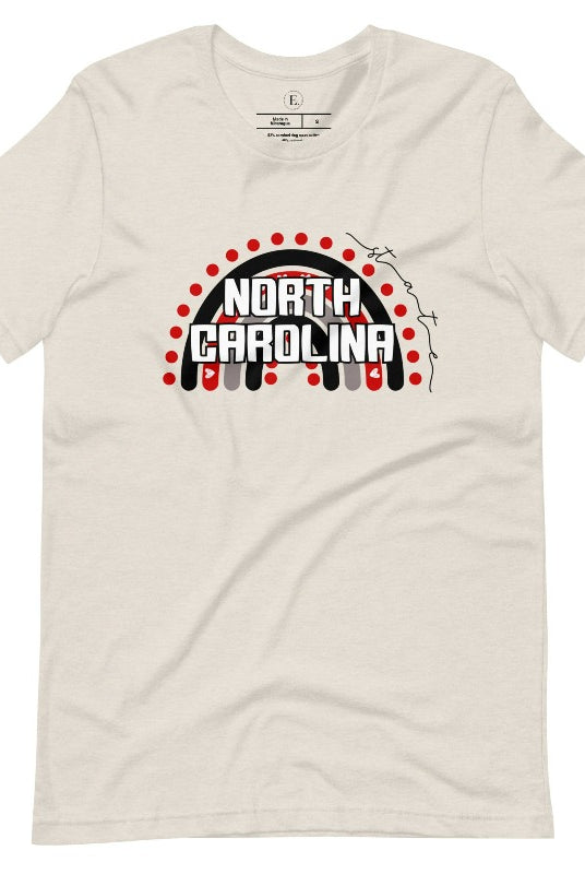 Looking for a way to show off your vibrant spirit? Look no further than this NC State University t-shirt. The NC State colors shine on a boho rainbow backdrop, representing the iconic North Carolina wordmark in a unique and trendy way on a heather dust colored shirt. 
