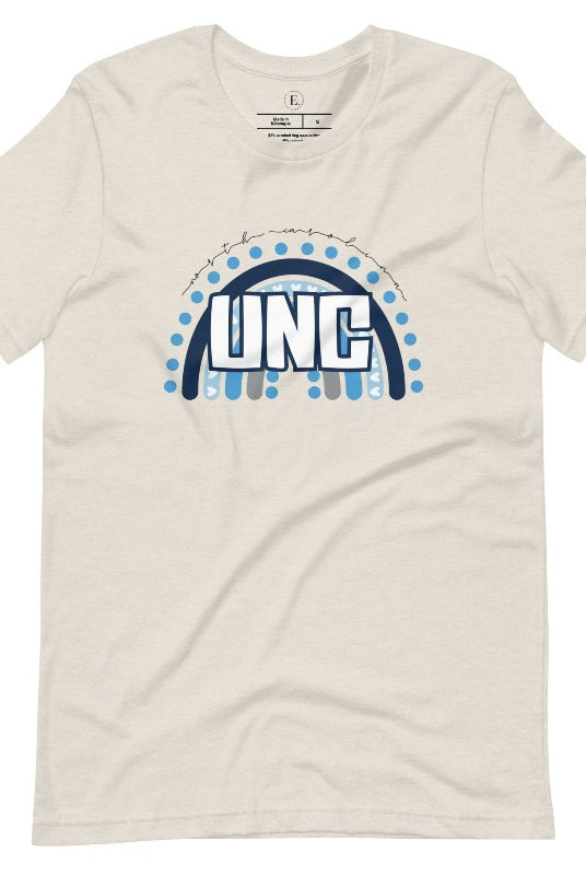 Check out this eye-catching t-shirt designed, featuring the iconic UNC letters set against a vibrant rainbow backdrop. Not only does it let you show off your school spirit, it also sends a trendy and powerful school spirit vibe on a heather dust colored shirt. 
