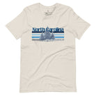 Show your school pride with this iconic North Carolina wordmark t-shirt. Made from premium materials, it features a North Carolina tree line in a the cool Carolina blue colors, representing a tradition of excellence for the nature that North Carolina offers on a heather dust shirt. 
