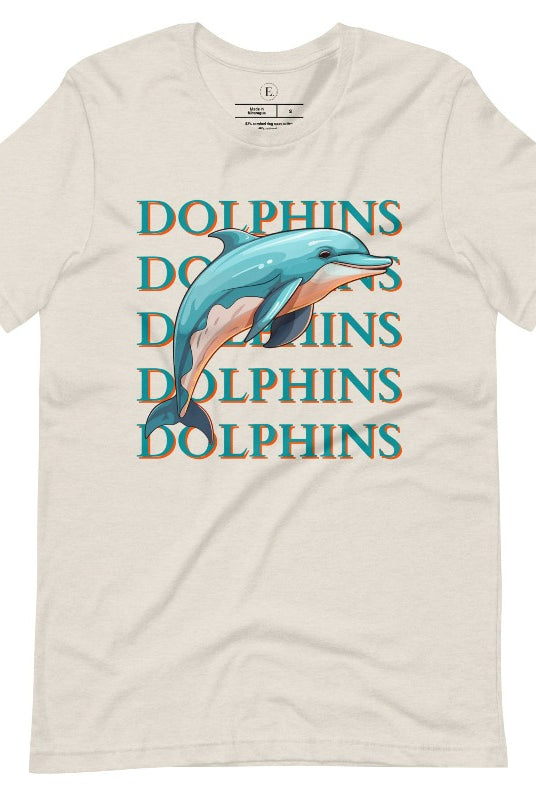 Introducing the Bella Canvas 3001 unisex graphic t-shirt that will make a splash! Dive into style with our Dolphins Dolphins Dolphins Dolphins tee, featuring a playful illustration of a dolphin for the Miami Dolphins football team on a heather dust colored shirt. 