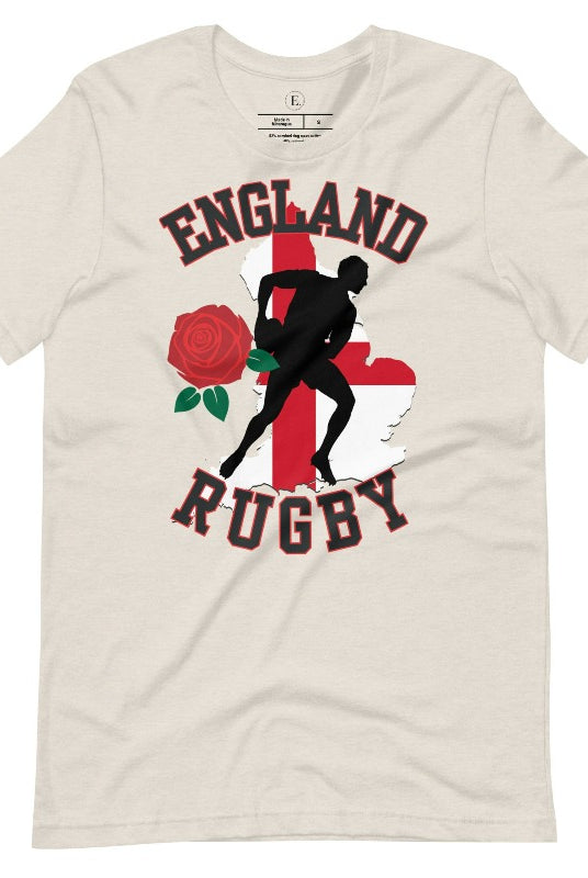 Introducing our England Rugby Graphic T-Shirt - the ultimate fusion of patriotism, rugby pride, and contemporary style! This captivating t-shirt features the words "England Rugby" and the iconic England flag artfully incorporated within the outline of the country, accompanied by a dynamic rugby player graphic on a heather dust colored shirt. 